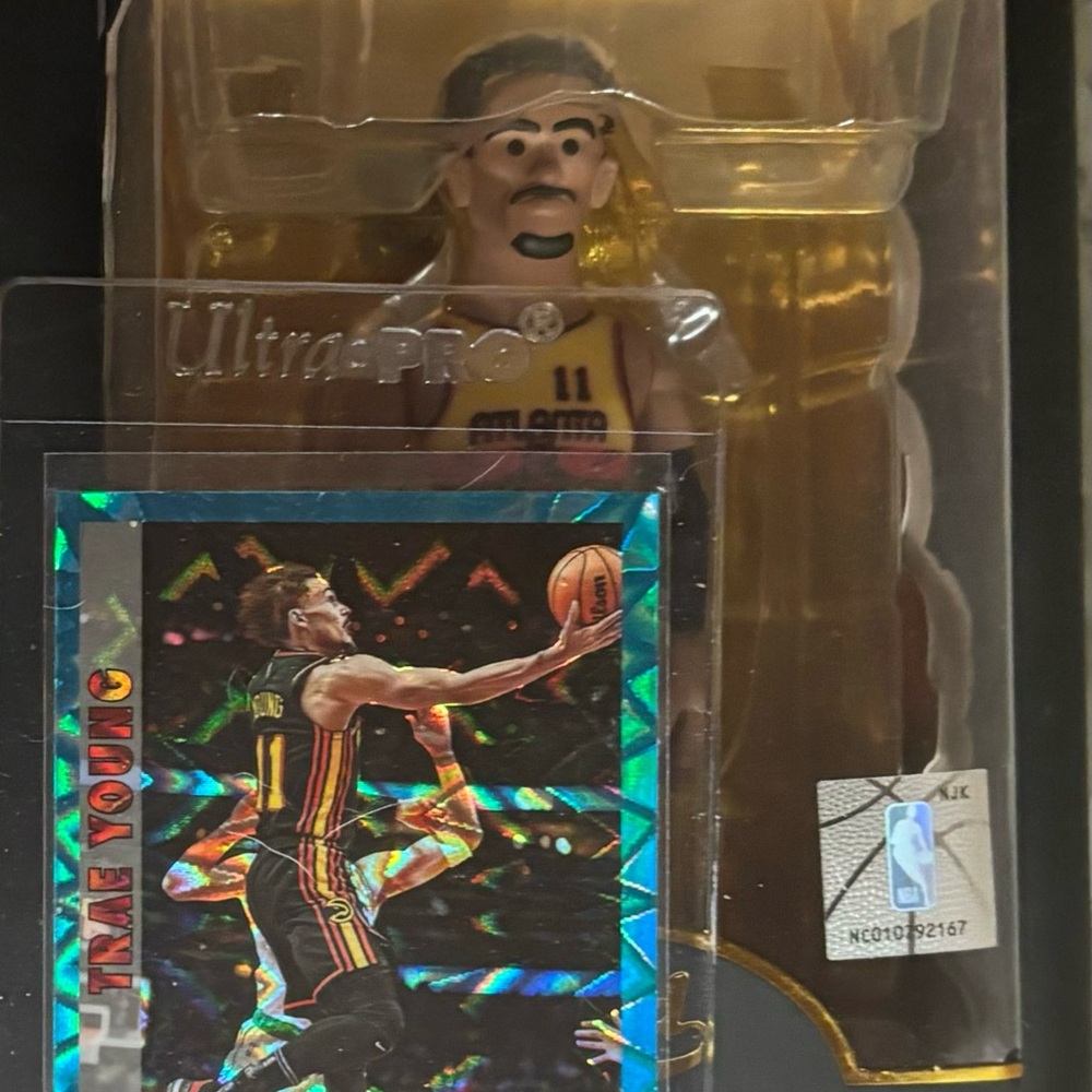 Trae Young Exclusive Gold Funko with a Rare Trae Young Card to Match